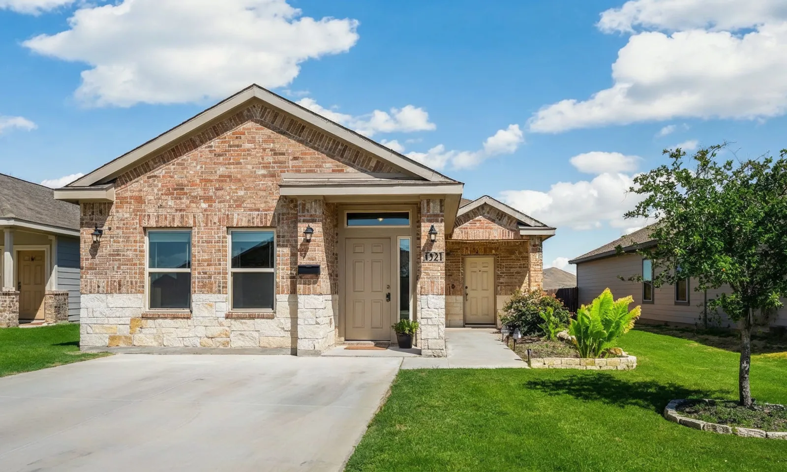 Completed Los Angeles garage conversion transformed into modern accessory dwelling unit with new windows, entry door, and seamless home integration